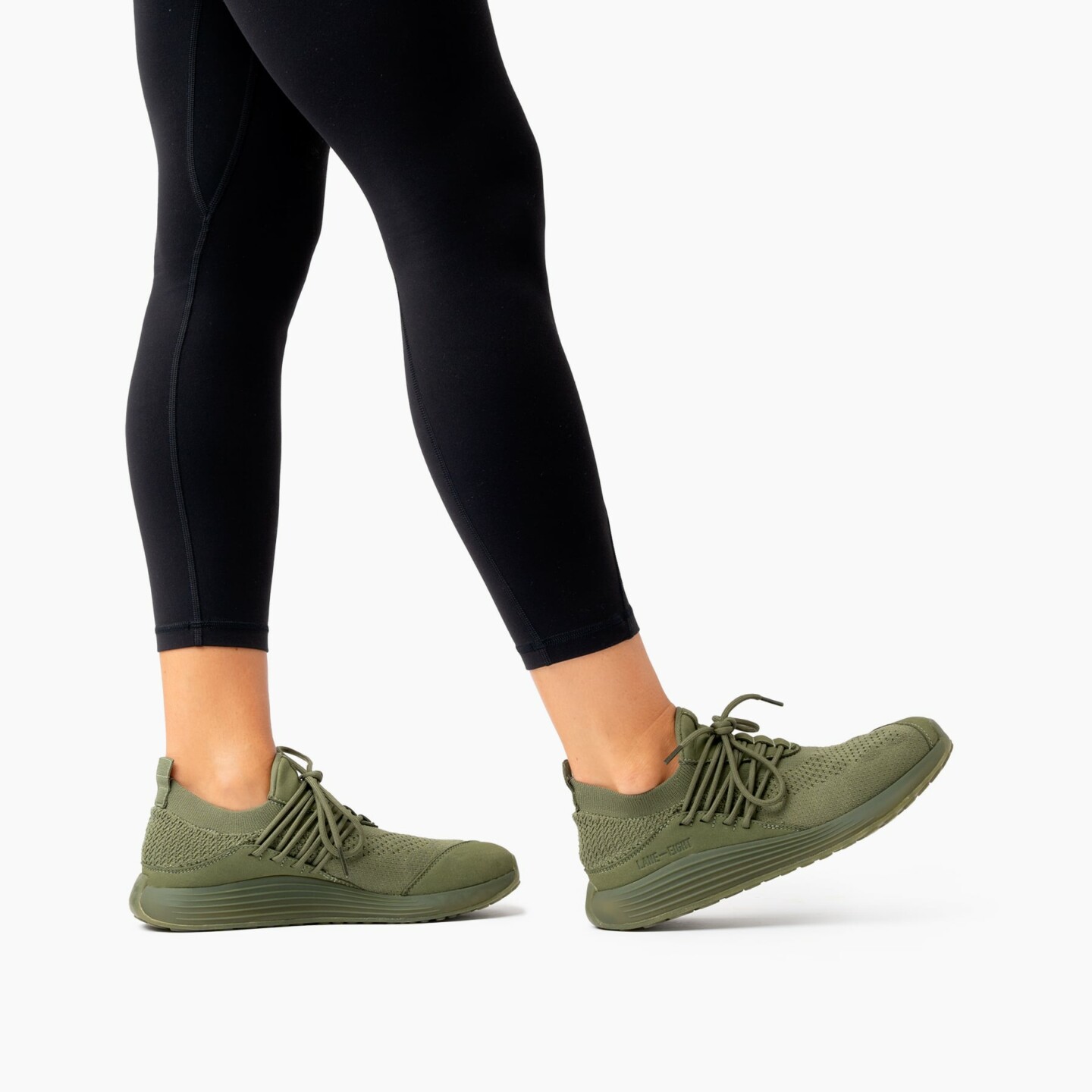 LANEEIGHT-TRAINER-AD-1-EarthGreen-WomensOnFoot